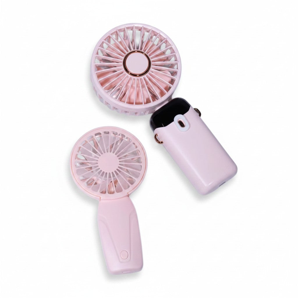 Two LashDestination portable handheld fans in pastel pink with rechargeable batteries and compact designs.