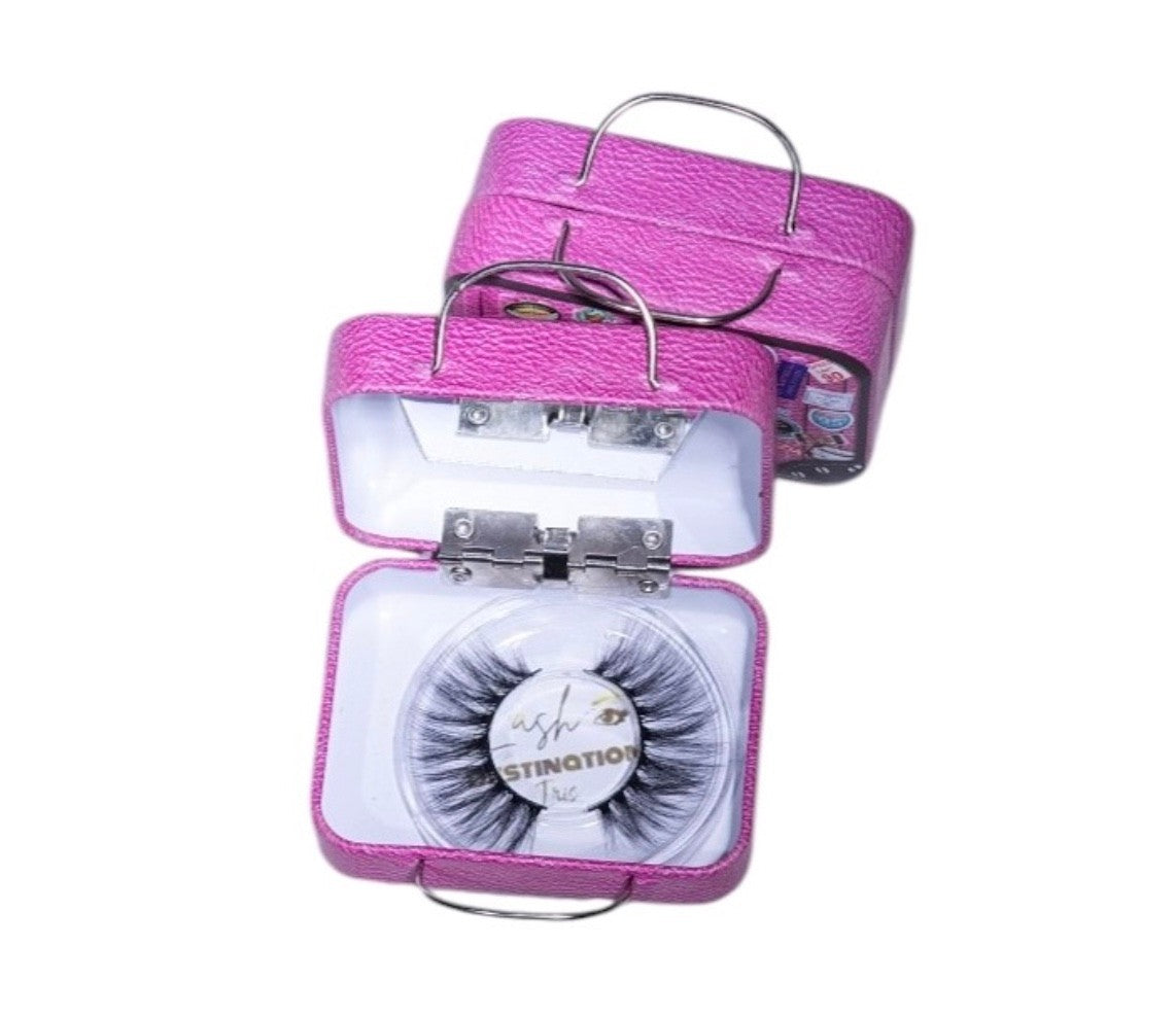 LashDestination pink miniature suitcase lash storage case with a built-in mirror and false eyelashes inside