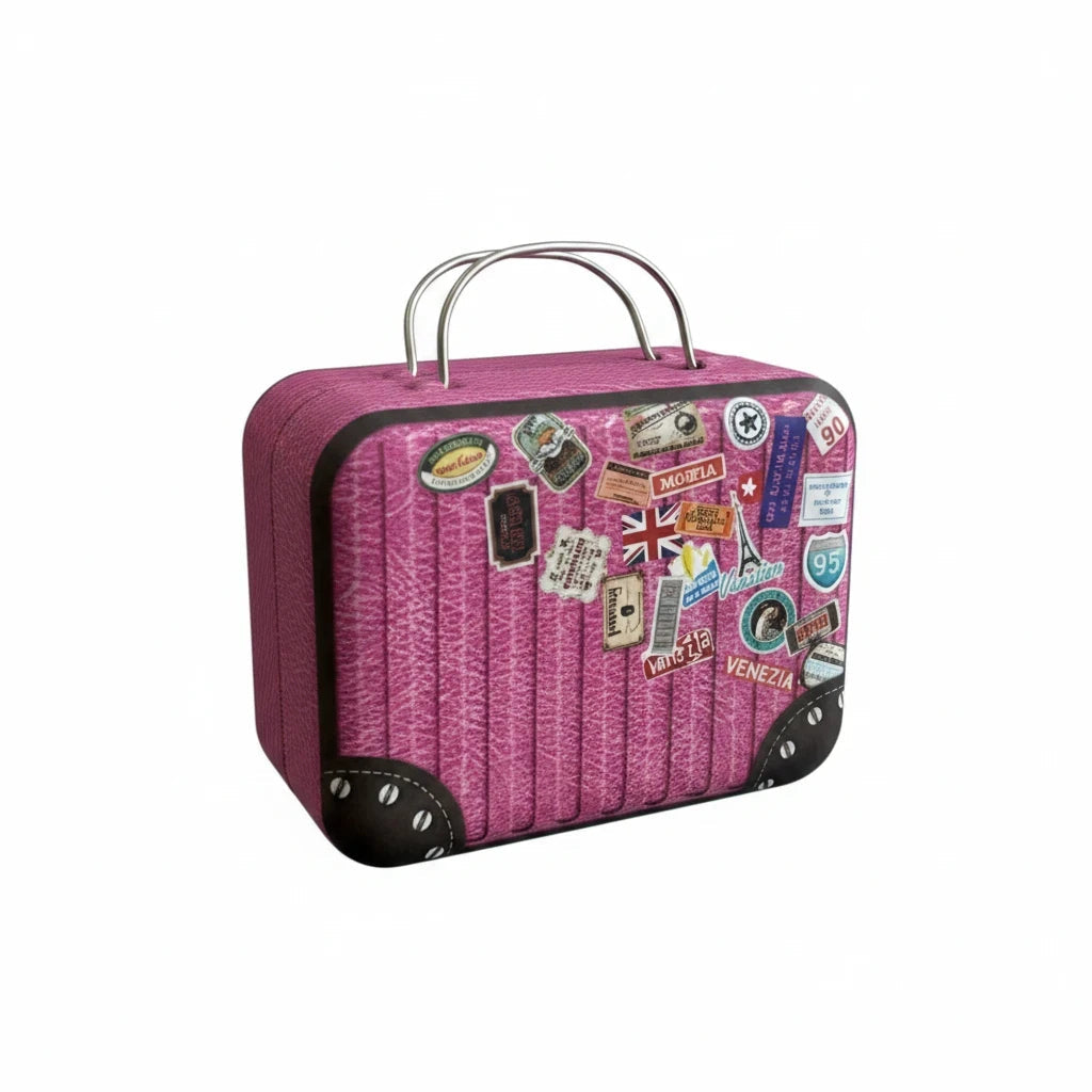 LashDestination pink miniature suitcase lash storage case with travel-themed stickers and a sturdy silver handle.